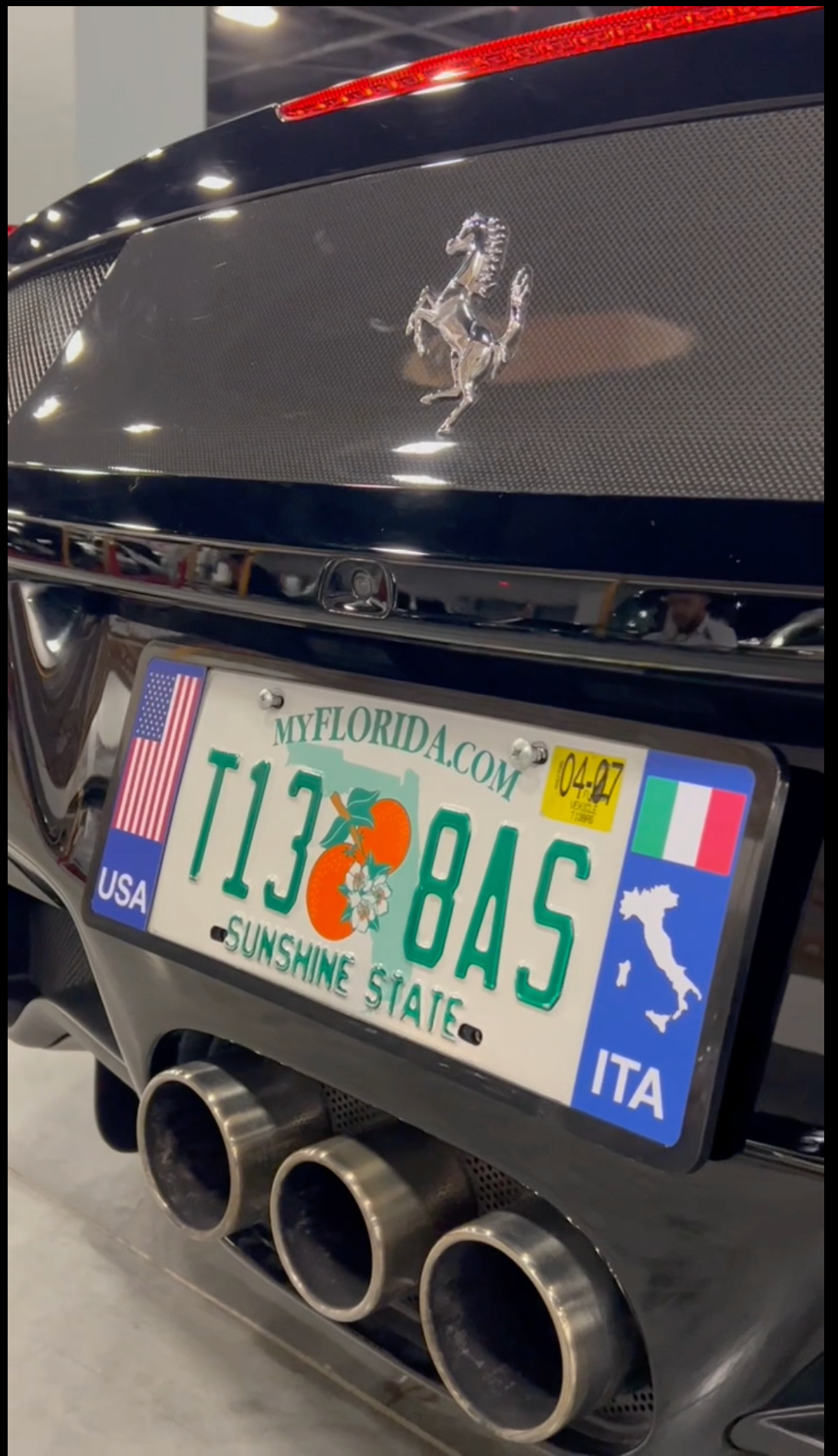 Back of a Ferrari with DFS Florida license plate frame