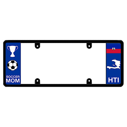 A black elongated Haitian license plate frame soccer mom themed featuring a soccer ball and trophy graphic on the left with a Haitian flag, map silhouette, and country graphics on the right by DFS Brands.