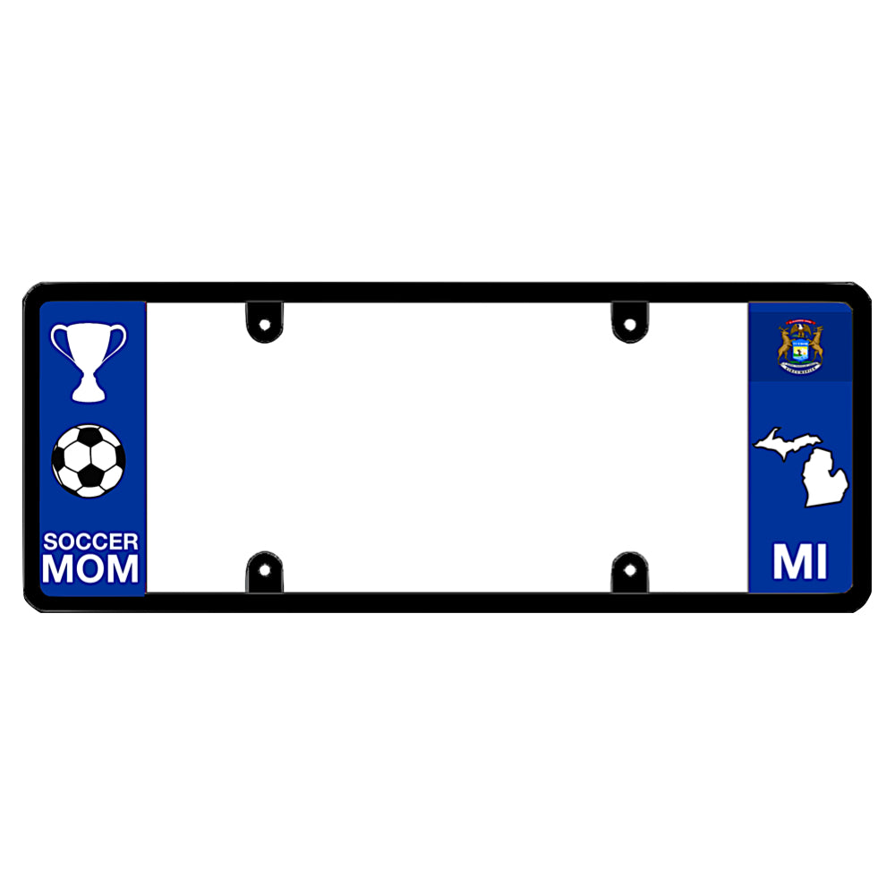 Michigan license plate frame by DFS featuring a patented elongated design with a soccer ball, trophy, and "SOCCER MOM" text on the left wing, alongside the Michigan state flag, MI text, and Michigan map outline on the right