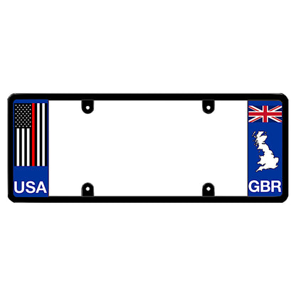 Black license plate frame featuring a thin red line American flag above white USA lettering on the left panel, and a British Union Jack flag above a white United Kingdom map outline and GBR lettering on the right panel