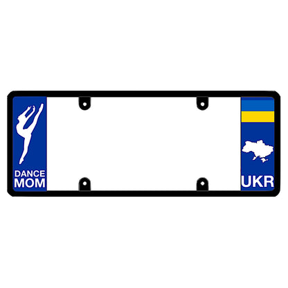 A dance mom themed black elongated Ukraine license plate frame with a white dancer silhouette on the left and a blue and yellow Ukrainian flag, map silhouette, and UKR text on the right by DFS Brands.