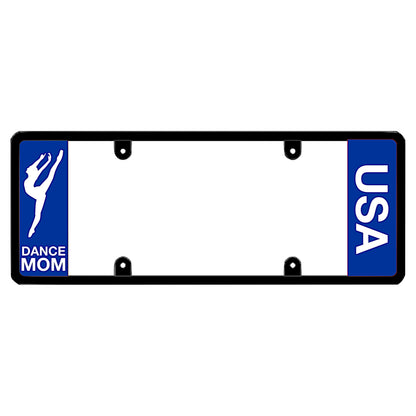 Black license plate frame featuring a blue left panel with a white female dancer silhouette above white Dance Mom lettering, and a blue right panel with vertical white USA lettering