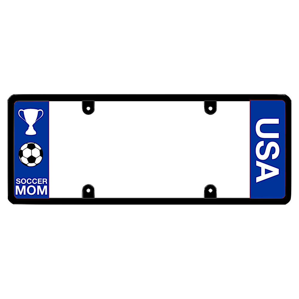 Black license plate frame featuring a blue left panel with a white trophy icon and a soccer ball icon above white Soccer Mom lettering, and a blue right panel with vertical white USA lettering